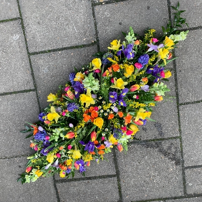 Bright, spring, vibrant, coffin, spray, Funeral, sympathy, wreath, tribute, flowers, florist, gravesend, Northfleet, Kent, london