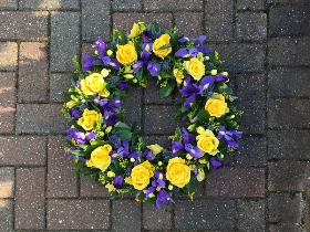 Purple, blue, yellow, wreath, funeral flowers, funeral tribute, gravesend