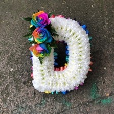 Rainbow, letters, funeral, flowers, tribute, wreath, frame, bright, colours, unicorn, funeral, sympathy, flowers, floral, florist, Gravesend, kent, london