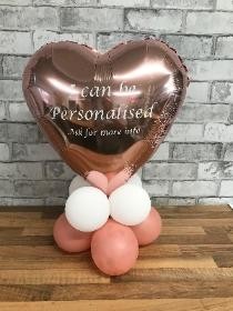 Personalised balloon table arrangement