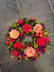 Bright, vibrant, cerise, hot pink, purple, coral, rose, carnation, Funeral, sympathy, wreath, tribute, flowers, florist, gravesend, Northfleet, Kent, london
