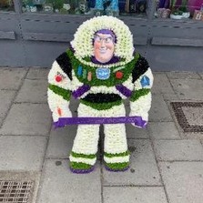 Buzz, lightyear, toy, story, character, cartoon, funeral, flowers, wreath, tribute, florist, gravesend, northfleet, kent, london