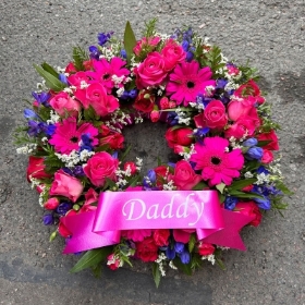Cerise, blue, pink, hot, royal, bright, Funeral, sympathy, wreath, tribute, flowers, florist, gravesend, Northfleet, Kent, London, Essex 