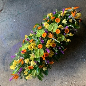 Tropical, luxury, coffin, spray, bright, Funeral, sympathy, wreath, tribute, flowers, florist, gravesend, Northfleet, Kent, London