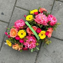 Tutti fruiti, yellow, orange, pink, basket, Funeral, sympathy, wreath, tribute, flowers, florist, gravesend, Northfleet, Kent, London, Essex 